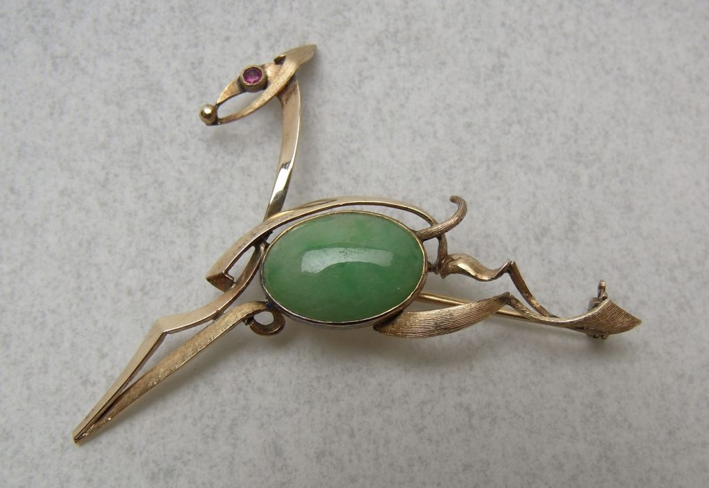 A 14ct gold hand made brooch in the form of a horse