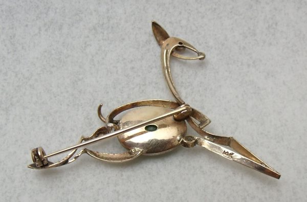 Back of a 14ct gold stylised horse brooch