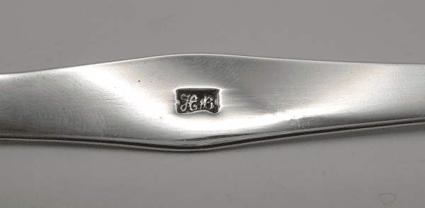 Makers Mark on a Set of Hester Bateman silver sugar tongs