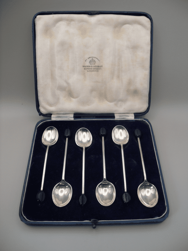 Boxed set of Mappin & Webb sterling silver coffee bean spoons